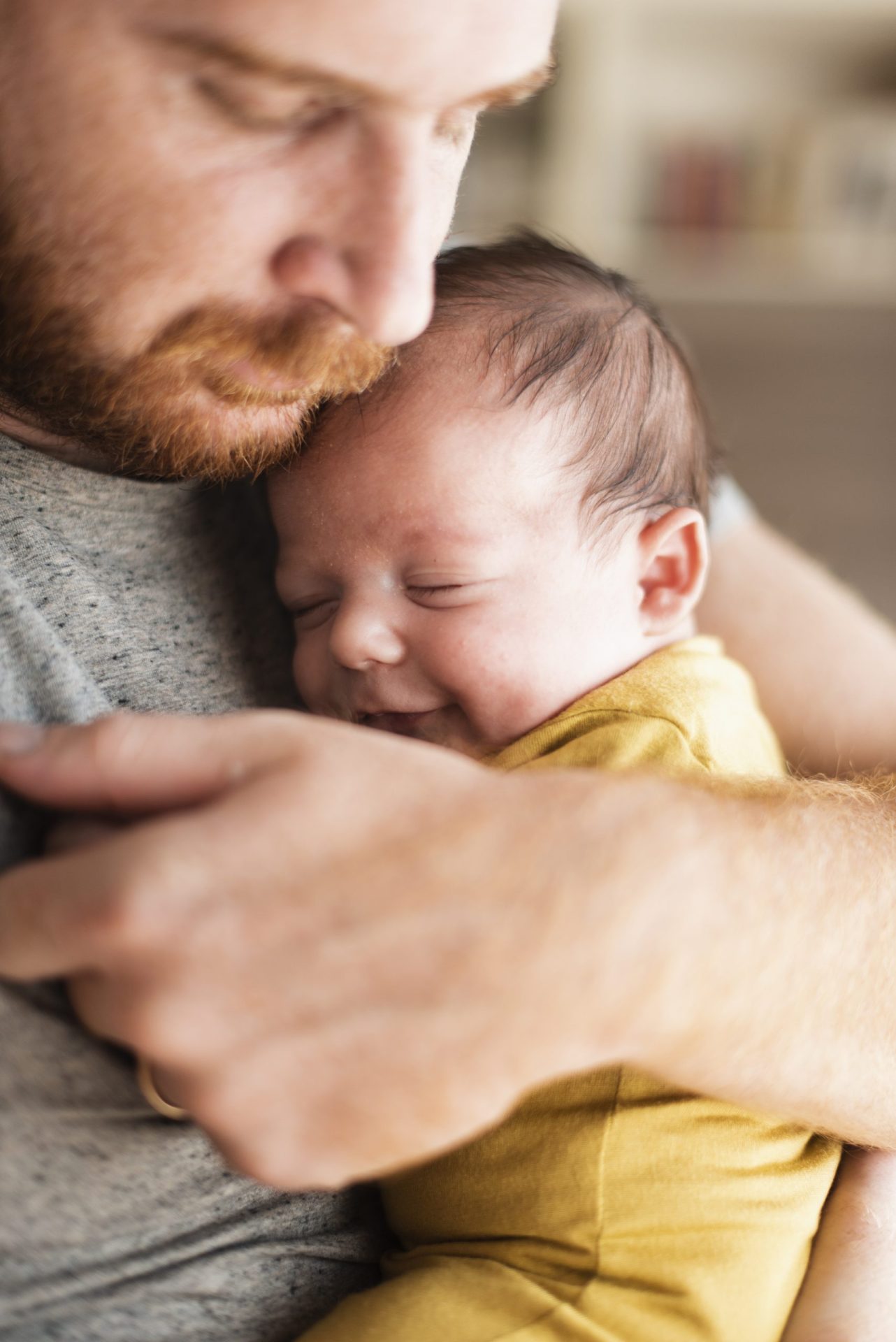 close-up-father-holding-small-baby